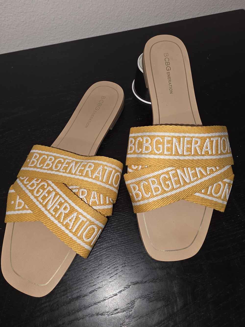 BCBGeneration Women's Yellow Logo Crossband Slide Sandals